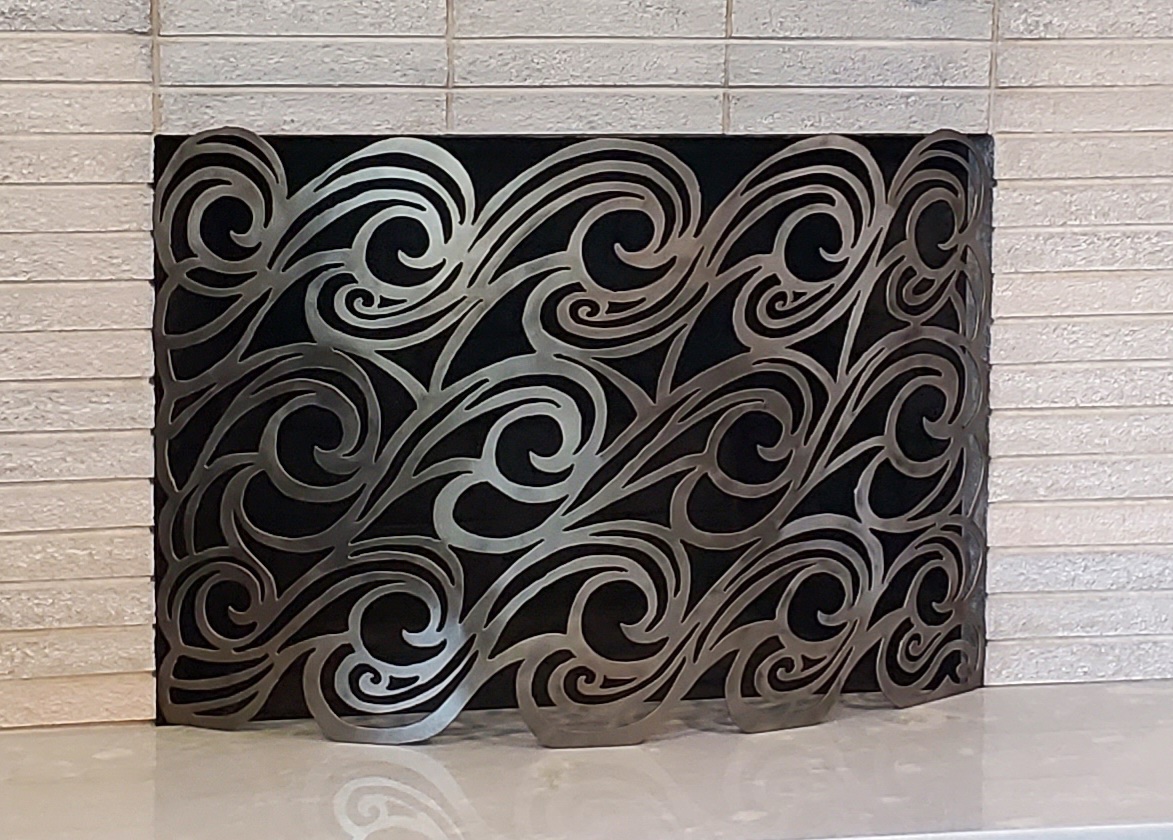 Ocean waves fireplace screen sculpture